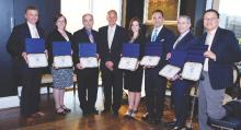 SVS President Dr. Bruce Perler honors seven of the new SVS Distinguished Fellows Wednesday at the Vascular Annual Meeting. These members have made substantial contributions in two of three categories – research, service or education – in a sustained manner©Martin Allred