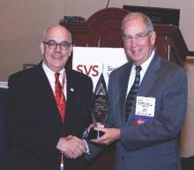 At the first Vascular Quality Initiative Annual Meeting, VQI President Dr. Larry Kraiss (left) presented Dr. Jack Cronenwett with an award for his “exceptional service and leadership.